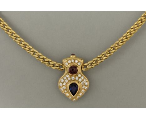 necklace in yellow gold (18 carat) with a pendant with a drop shaped sapphire, a cabochon cut ruby and ca 0,40 carat of quali