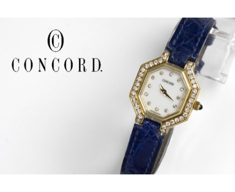 completely original Concord marked ladies' wristwatch in yellow gold (18 carat) with a face in mother of pearl with and surro