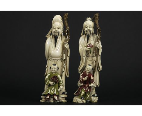 pair of antique Chinese late Qing-period sculptures in partially polychromed ivory with CITES certificate "2024/BE04180/CE"Th