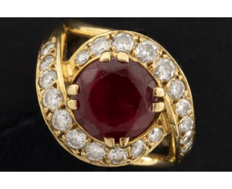 vintage ring in yellow gold (18 carat) with a red stone and ca 0,60 carat of high quality brilliant cut diamondsVintage ring 