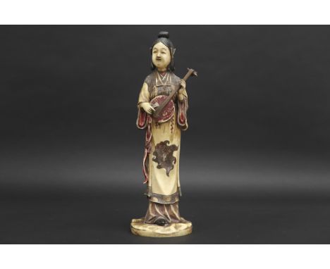 antique Chinese "Girl with an musical instrument" sculpture in ivory with remains of the original polychrome and gilding with