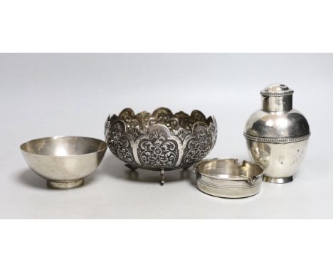 An Indian embossed white metal bowl, diameter 12.9cm, a George V silver tea caddy?, a modern silver Links of London small bow