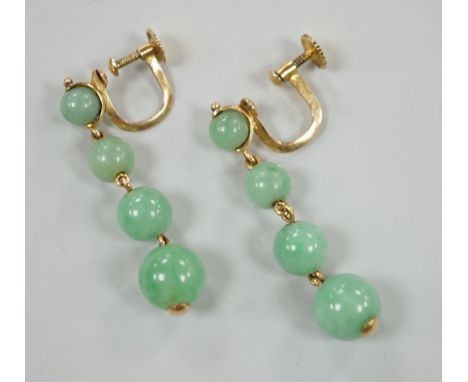 A pair of yellow metal and graduated four stone jade bead drop earrings, 39mm, gross weight 6.6 grams.