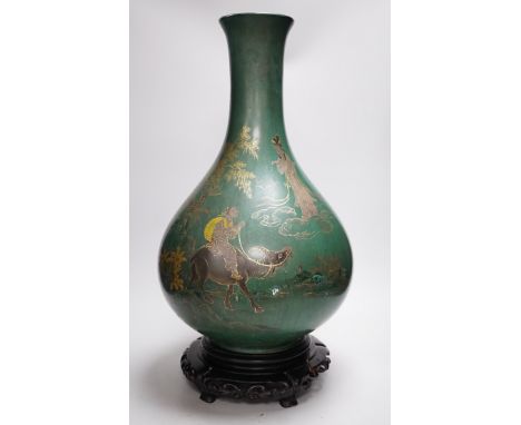 A large Chinese Fuzhou lacquer green ground vase and stand, early 20th century, 54 cm high