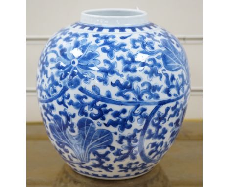 A late 19th century Chinese blue and white ovoid jar. 22cm tall, apocryphal Kangxi mark