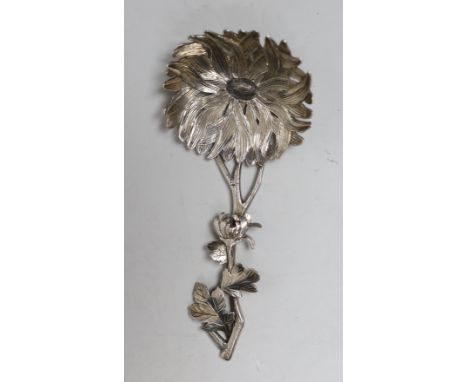 A Chinese? white metal  spoon, modelled as a stemmed flower, maker's mark WS, 12.6cm, 46 grams, centre of bowl lacking enamel