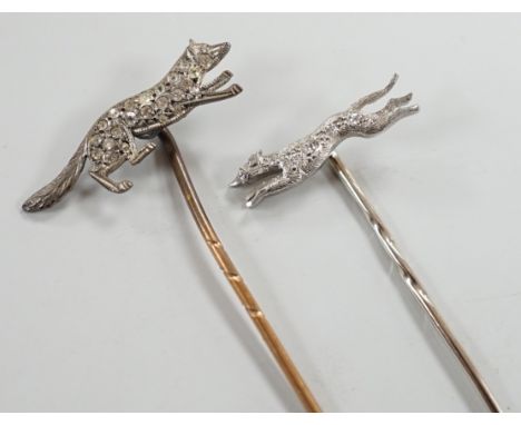 A mid 20th century white metal and diamond chip set hound stick pin, 57mm, in Asprey box and a similar paste set fox stick pi