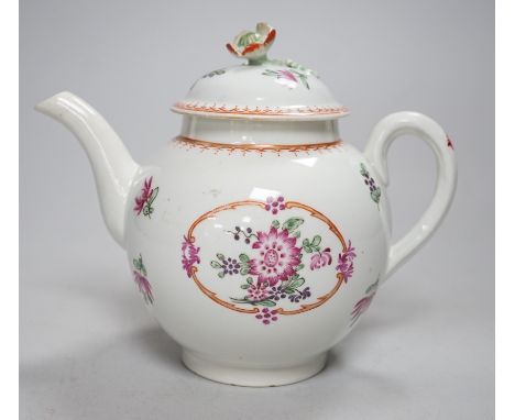 An 18th century Worcester teapot and cover painted in Chinese export style with flowers in an oval panel. 16cm tall