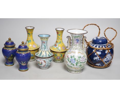 A group of Canton enamel vases, a pair of cloisonné enamel jars and a blue and white jar. Tallest 15.5cm