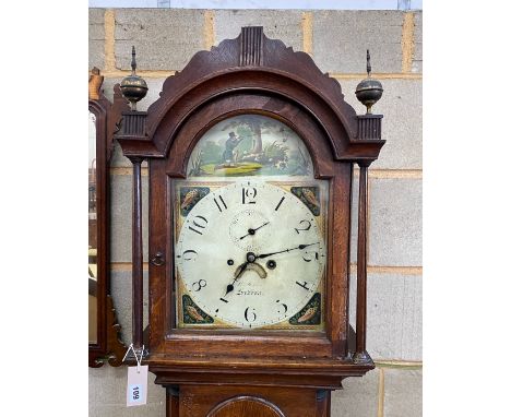 An early 19th century oak cased 8 day longcase clock, the arched painted dial marked Sudbury, height 212cm
