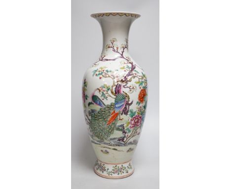 A large Chinese famille rose peacock vase. 46cm tall