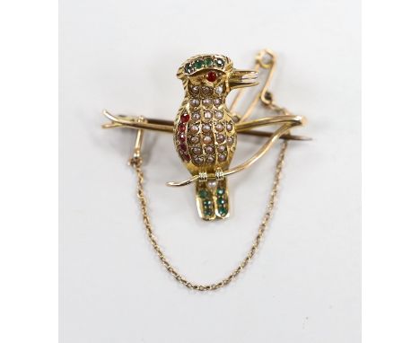 A yellow metal, split pearl ruby and emerald set Kingfisher? bar brooch, length 39mm, gross weight 6.9 grams.