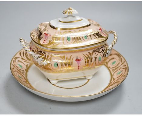 A 19th century Derby sucrier and cover and a matching saucer dish decorated in neo-classical style on a salmon coloured groun
