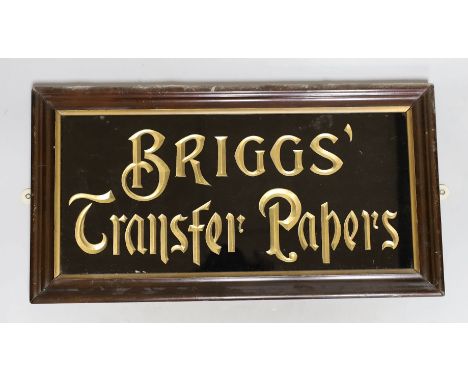 A gilt ‘Briggs Transfer Papers’ advertising panel, 23x42cm including frame