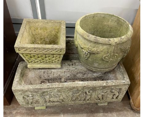 A pair of rectangular reconstituted stone garden planters length 80cm, a circular planter and smaller square planter.