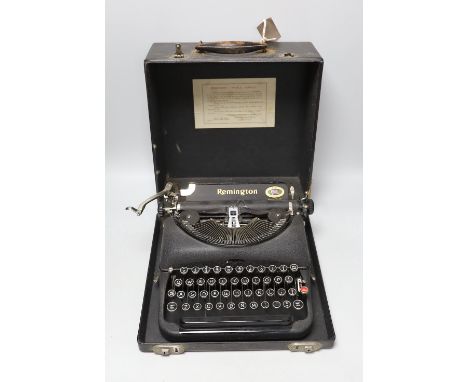 A cased Remington, British made, portable typewriter, 30cms deep