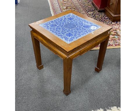 A Chinese hardwood and underglaze blue porcelain tile inset table, width 42cm, depth 42cm, height 43cm