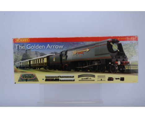Hornby China OO Gauge Golden Arrow Train Set, a boxed, R1119 set, comprises West Country Class steam locomotive and tender Go