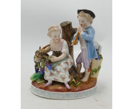 19th Sitzendorf porcelain figure group: of man playing a flute and seated woman with goat, h.17cm 