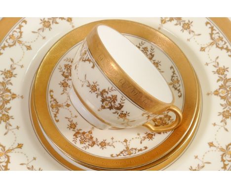 Minton gilded tea &amp; dinner ware in the Riverton design, comprising teapot, cups and saucers, rimmed soup bowls and dinner