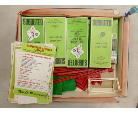 A collection of Subbuteo items to include pitch, goals and five teams 