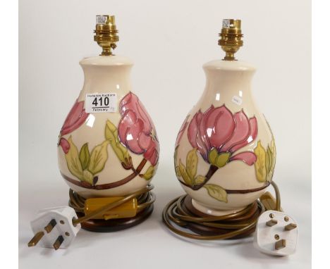 2x Moorcroft magnolia on cream lamp base. Height including fitting 28cm 