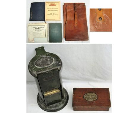 A lot containing various booklets to include GWR Rules and regulations with map with Western Region timetables. Leather GWR s