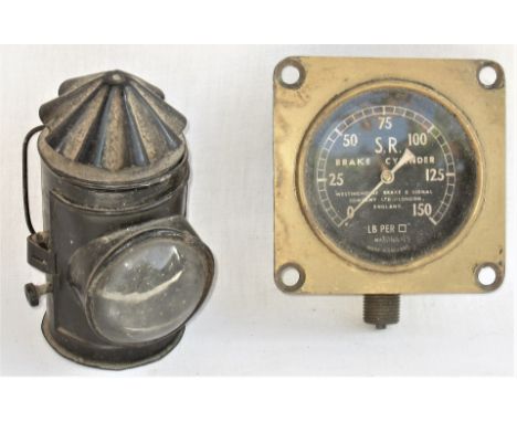 SR Brake Cylinder Gauge recovered from SR Stock together with a unmarked bulls-eye Policeman's Hand lamp. 