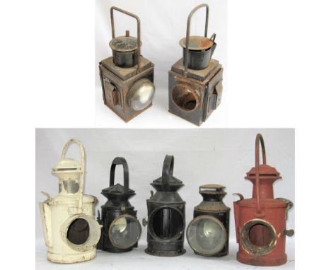 A lot containing a variety of Railway Lamps. 2 x BR Loco head lamps minus lenses and interiors.  3 aspect Army hand lamp comp