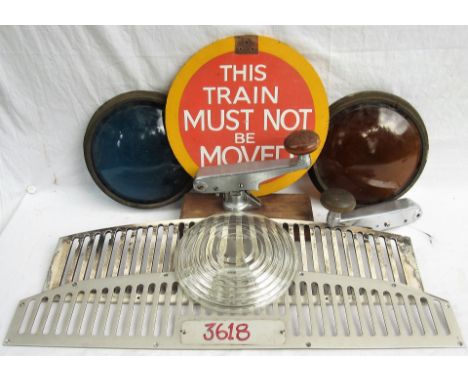 A lot containing a variety of London Transport items to include colour light lenses. 2 x Train Ventilation grilles. 2 x Train
