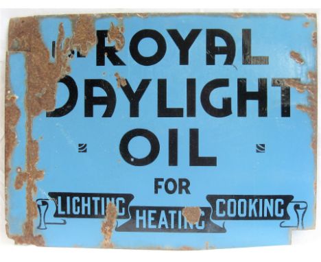 Enamel Advertising Sign. ROYAL DAYLIGHT OIL FOR LIGHTING HEATING and COOKING. Some loss to enamel but highly restorable sign.