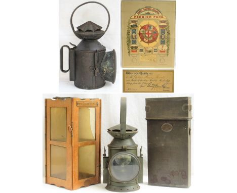 Army Railway Hand Lamp together with a foldaway WW1 Candle lamp with metal shoulder case. Dated 1915 made by CHRISTOPHER COLL