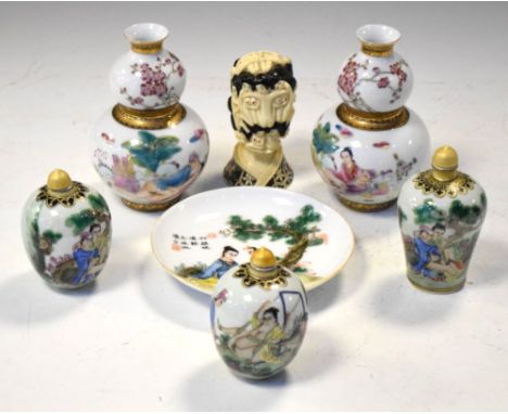 Group of modern Chinese porcelain decorated with erotic scenes, together with a cast resin erotic sculpture, 13cm high and sm