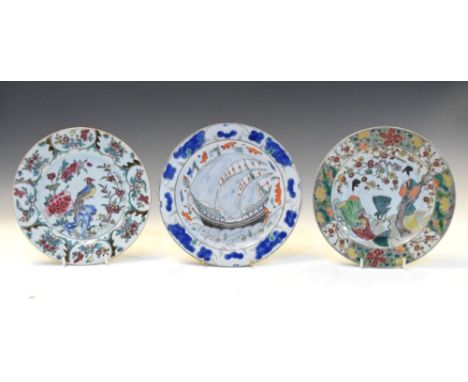 Chinese Export Famille Verte porcelain plate decorated with a galleon, another decorated with women in a garden with a peacoc