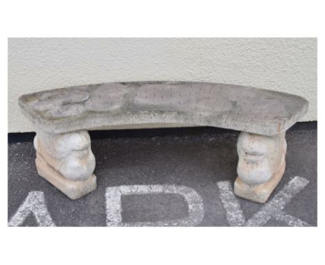 Modern 'stone' effect curved garden bench, the two supports in the form of a stylised winged lion of St. Mark, 145cm wide x 4