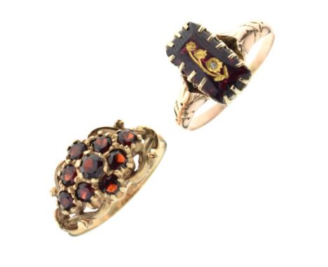 Unusual yellow metal dress ring set emerald-cut rectangular red stone (tests as ruby), with gilt intaglio decoration and inse