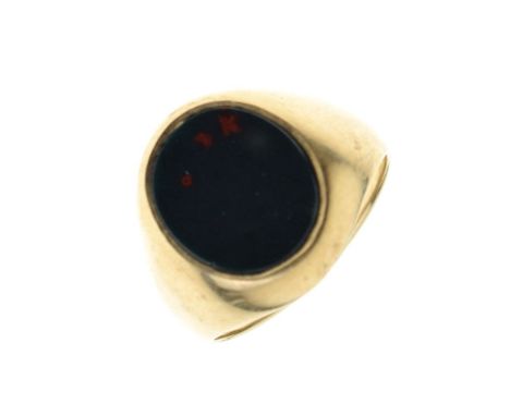 Yellow metal and bloodstone signet ring with oval matrix, shank stamped 9, size R½, 6.8g gross approx Condition: Some of hall