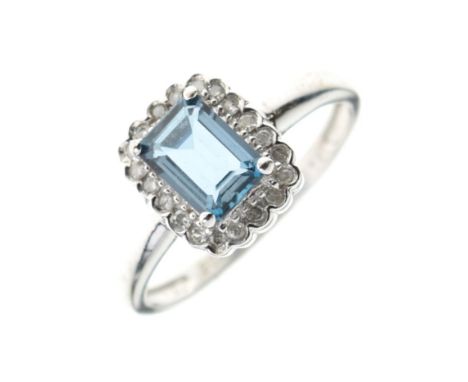 White metal dress ring set rectangular aquamarine-coloured emerald-cut stone, shank stamped 9ct, size O, 2.4g gross approx Co