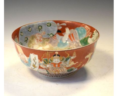 Late 19th/early 20th Century Chinese porcelain footed bowl painted with scenes of Immortals reserved on an iron-red ground, p