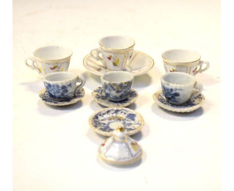 Three 19th Century Chinese miniature blue and white porcelain cups and saucers, together with three polychrome floral painted