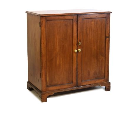 19th Century mahogany two door cupboard, 102cm x 57cm x 110cm Condition: Losses to edges of top panel, numerous scuffs, scrat