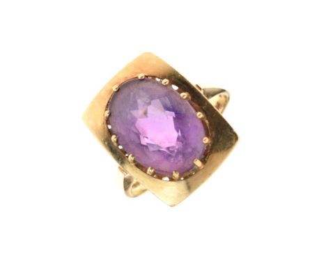 9ct gold dress ring set faceted amethyst-coloured stone approximately 14mm x 10mm, size O, 5.2g gross approx Condition: **Due