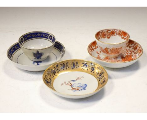 Chinese export tea bowl and saucer in the Neo-classical style, together with a similar Chinese export saucer and a chinoiseri