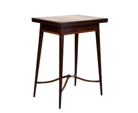 Edwardian crossbanded mahogany rectangular fold-over top card table, standing on tapered square supports united by a cross st