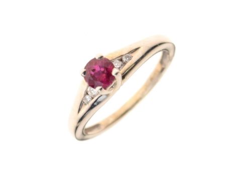 9ct gold dress ring set central ruby between small diamonds, size K½, 2.2g gross approx Condition: Some minor flaws and losse