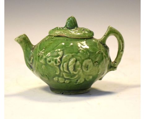 Chinese miniature tea pot and cover, moulded foliate decoration covered in a green glaze, 6.5cm high Condition: Chip to tip o