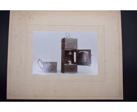 FLORENCE NIGHTINGALE'S LAMP:&nbsp;sepia photograph mounted on card, image approx 14.5 x 9.5cm, depicting metal lamp, to verso