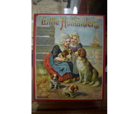 VINTAGE JIGSAW:&nbsp;'Little Hollanders...Spears Zig-Zag Puzzles for Children': circa 1900: four colour printed jigsaws compl