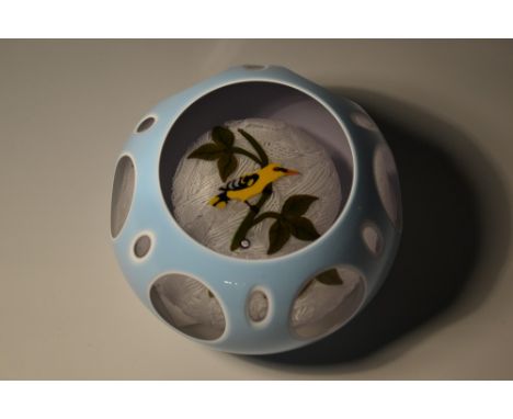 John Deacon - a triple overlayed turquoise, white and clear glass Golden Oriole paperweight, latticino cushion, decorated wit