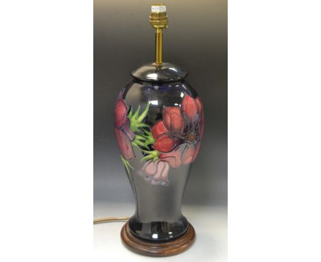 A large contemporary Moorcroft Clematis pattern  baluster lamp base, tubelined with large flowerheads and foliage, in tones o
